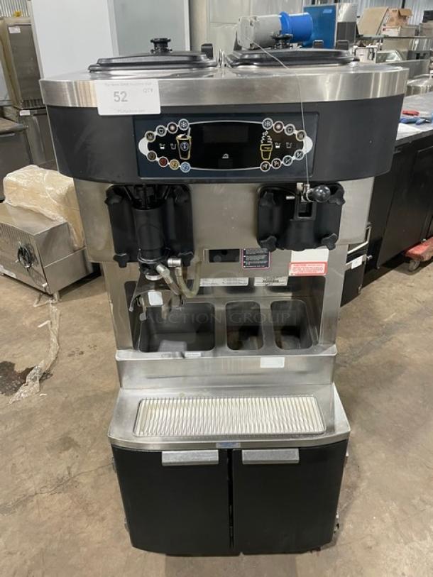 Taylor Commercial Stainless Steel Electric Powered  Combination Shake/Soft Serve Ice Cream/Frozen Yogurt Machine! With Enclosed Syrup Cabinet Base! With Drip Tray & Built-In Utensil Organizer! Model: C602-33 SN: M2064790! 208-230V 3 Phase! On Casters! - Image 1 of 12