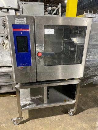 Eloma Genius Series Commercial Stainless Steel Electric Powered Full Size Combi Oven! With Touch Screen Controls! With Built-In Pan Holding Rack! Model: GENIUS MT 6-11 SN: ELN120734! 208V! With Single Shelf Dual-Sectioned Equipment Stand/Cart! On Casters!
