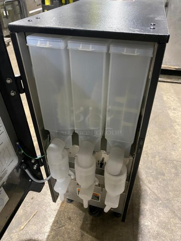 Bunn Commercial Black Electric Powered Countertop Hot Chocolate/Cappuccino Hot Beverage Fresh Mix Dispenser Machine! With 3 Hoppers! With Customizable LED Front Display! Model: FMD-3 SN: FMD0130530! 120V 1 Phase! On Legs! - Image 6 of 7