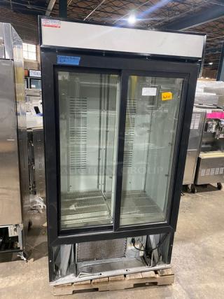 Carrier CMX Series Commercial Black Double Glass Sliding Door Reach In Merchandiser Refrigerator! With Poly Coated Wire Racks! Model: MC1100! 120V 1 Phase!