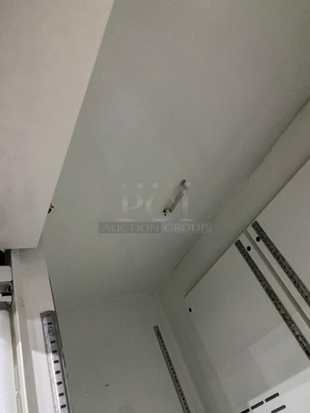 Carrier CMX Series Commercial Black Double Glass Sliding Door Reach In Merchandiser Refrigerator! With Poly Coated Wire Racks! Model: MC1100! 120V 1 Phase! - Image 6 of 8
