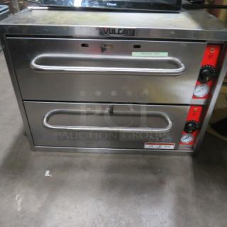 One Vulcan 2 Drawer Warmer. Model# VW2S. 120 Volt. 950 Watt. 27.5X25X20. $2378.00