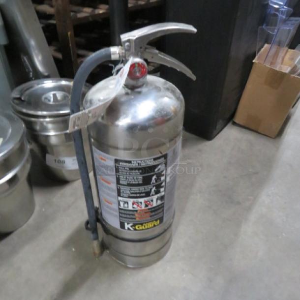 One K Guard Extinguisjer. - Image 1 of 1