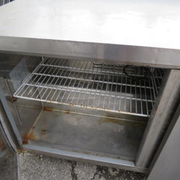 One 2 Door Avantco Cooler With 2 Racks, On Casters. Model# 178SSWT60RHC. 115 Volt. 60X29.5X39 - Image 2 of 2