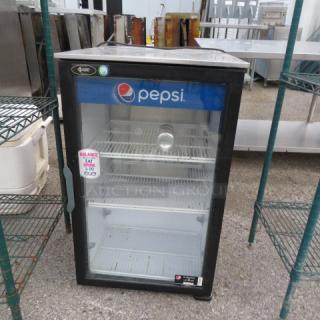 One Countertop Glass Door Cooler With 3 Racks. 120 Volt. Model# DC6LP-HC.  2.5X26X33.5