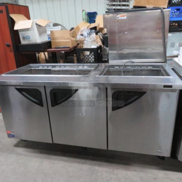 One Turbo Air 3 Door Refrigerated Prep Table On Casters. No Lids. Model# TST-72SD-30-N. 115 Volt. 72.5X34X36 - Image 1 of 1