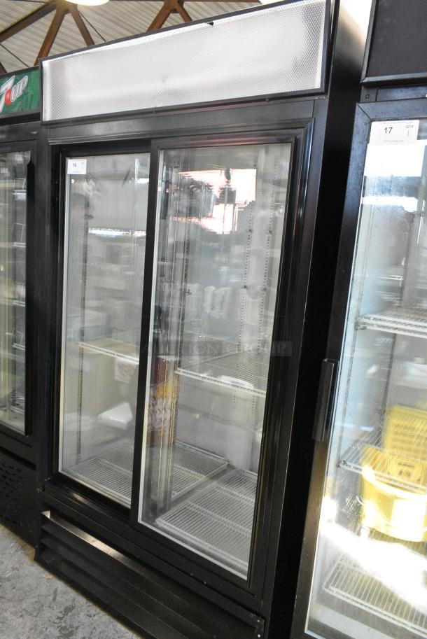 Metal Commercial 2 Door Reach In Cooler Merchandiser w/ Poly Coated Racks. 115 Volts, 1 Phase. Tested and Powers On But Does Not Get Cold - Image 1 of 10