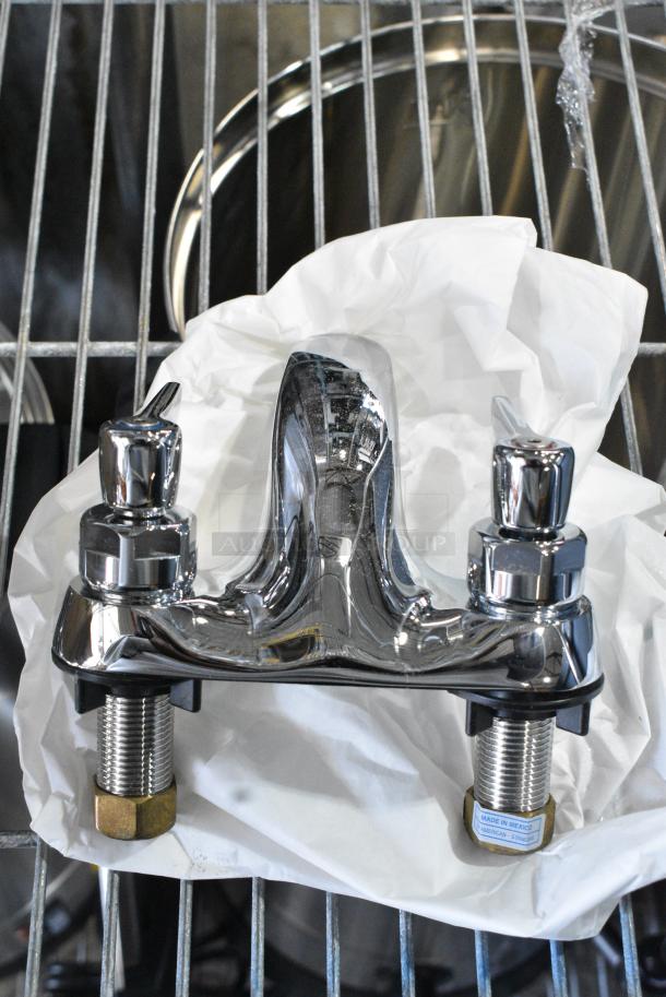 BRAND NEW SCRATCH AND DENT! American Standard 5500140.002 Monterrey 1.5 GPM Deck-Mount Lavatory Faucet with 4" Centers, Cast Brass Spout, and Lever Handles - Image 1 of 5