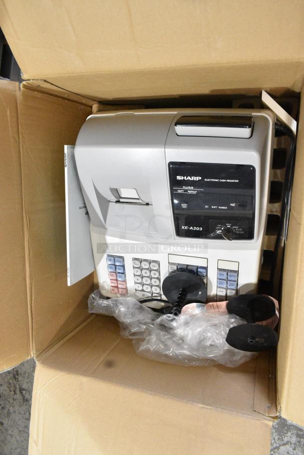 IN ORIGINAL BOX! Sharp XE-A203 Countertop Electronic Cash Register. 115 Volts, 1 Phase. - Image 1 of 4