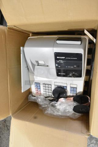 IN ORIGINAL BOX! Sharp XE-A203 Countertop Electronic Cash Register. 115 Volts, 1 Phase.