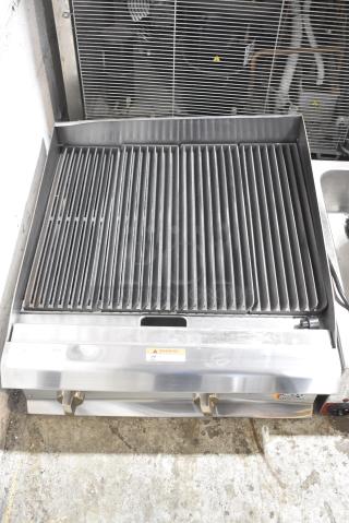 BRAND NEW SCRATCH AND DENT! Cooking Performance Group CPG 351CRCPG24NL Stainless Steel Commercial Countertop Natural Gas Powered Charbroiler Grill. 80,000 BTU.
