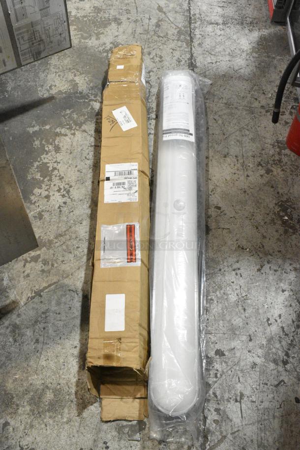 2 BRAND NEW SCRATCH AND DENT! Luminaire VFRA4F-50KFP Vapor Tight Fixture. 100-277 Volts, 1 Phase. 2 Times Your Bid! - Image 1 of 4