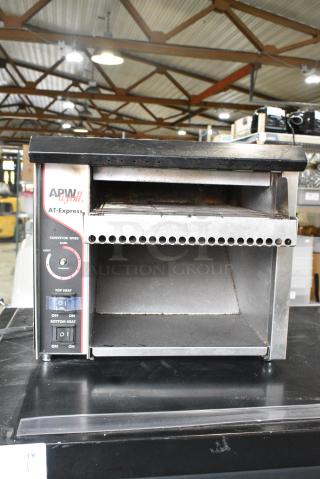 APW Wyott AT EXPRESS Metal Commercial Countertop Electric Powered Conveyor Oven. 120 Volts, 1 Phase. Tested and Working!