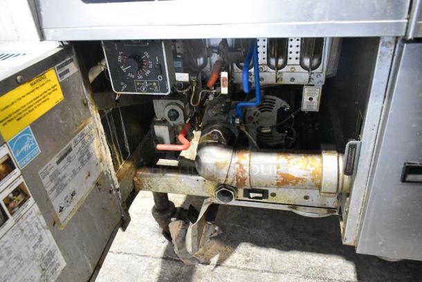 Pitco Frialator SSH60W Stainless Steel Commercial Natural Gas Powered 4 Bay Deep Fat Fryer w 6 Metal Fry Baskets on Commercial Casters.  100,000 BTU. - Image 12 of 16