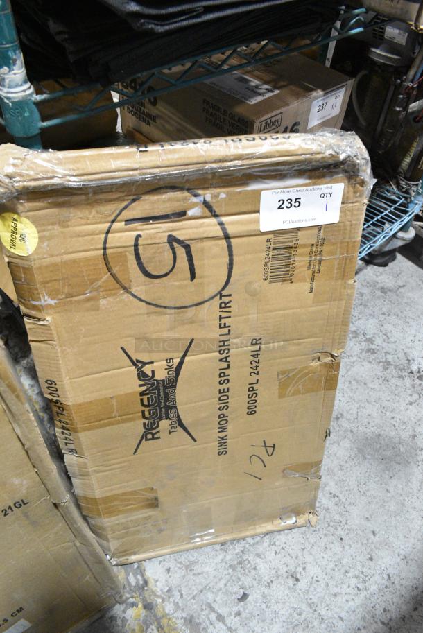 BRAND NEW SCRATCH AND DENT! Regency 600SPL2424LR 15" High Stainless Steel Three-Sided Splash for 24" x 24" Mop Sink - Image 1 of 2