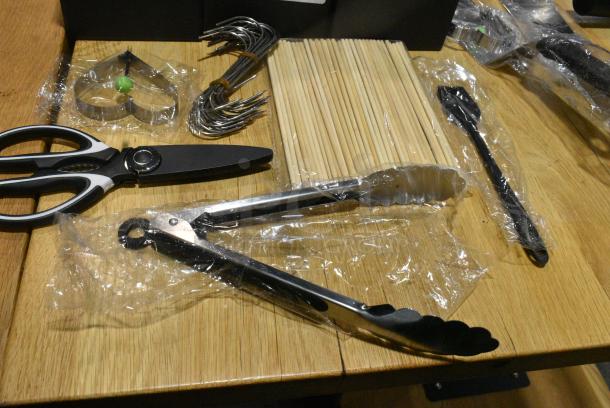 BRAND NEW SCRATCH AND DENT! Lot of Various Utensils Including Scissors, Tongs and Skewers and Black Poly Bin - Image 2 of 4