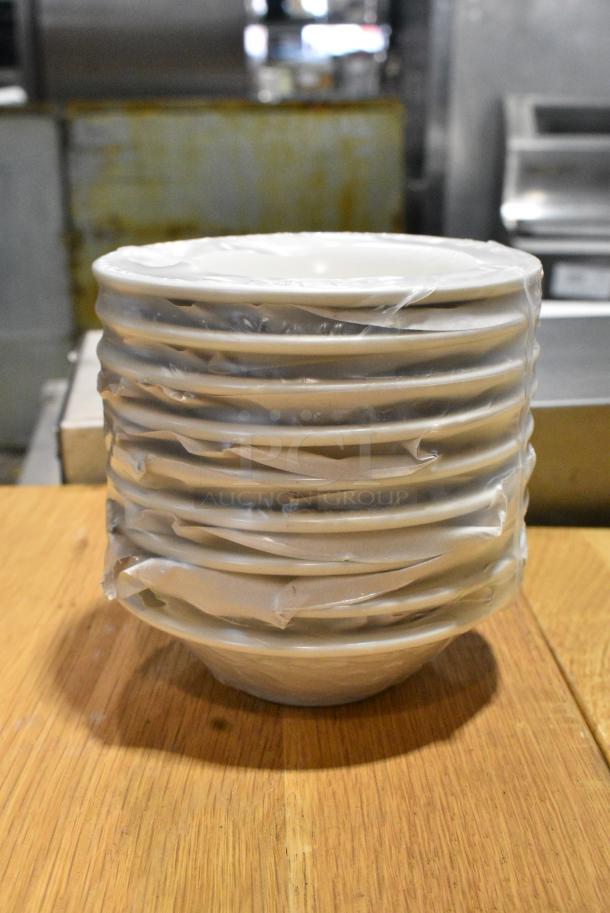 BRAND NEW SCRATCH AND DENT! Box of 36 Tuxton TNR-011 Nevada 3.5 oz. Eggshell Narrow Rim China Fruit Dish - 36/Case - Image 1 of 6