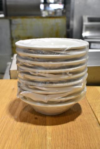 BRAND NEW SCRATCH AND DENT! Box of 36 Tuxton TNR-011 Nevada 3.5 oz. Eggshell Narrow Rim China Fruit Dish - 36/Case