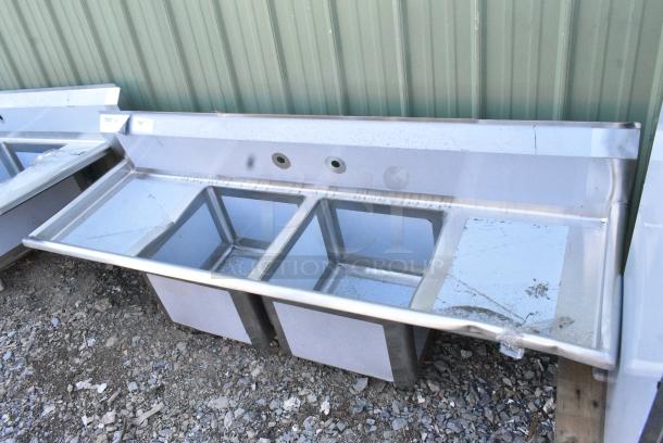 BRAND NEW SCRATCH AND DENT! Regency 600S21717218 72" 16-Gauge Stainless Steel Two Compartment Commercial Sink with Galvanized Steel Legs and 2 Drainboards - 17" x 17" x 12" Bowls.  No Legs. - Image 2 of 7