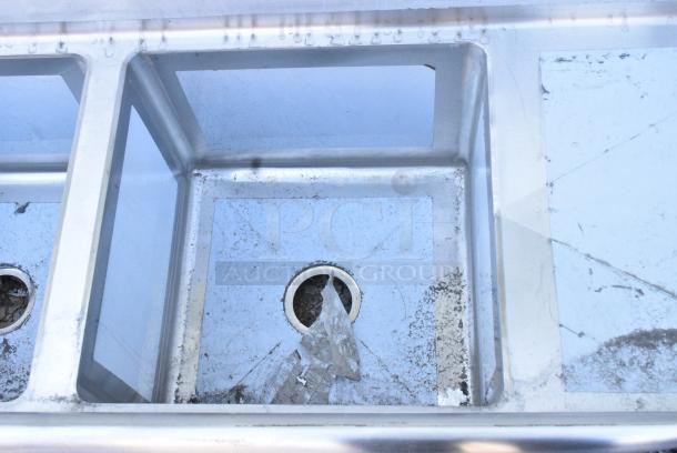 BRAND NEW SCRATCH AND DENT! Regency 600S21717218 72" 16-Gauge Stainless Steel Two Compartment Commercial Sink with Galvanized Steel Legs and 2 Drainboards - 17" x 17" x 12" Bowls.  No Legs. - Image 4 of 7