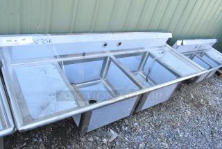 BRAND NEW SCRATCH AND DENT! Regency 600S22424218 98" 16 Gauge Stainless Steel Two Compartment Commercial Sink with 2 Drainboards - 24" x 24" x 14" Bowls. No Legs.