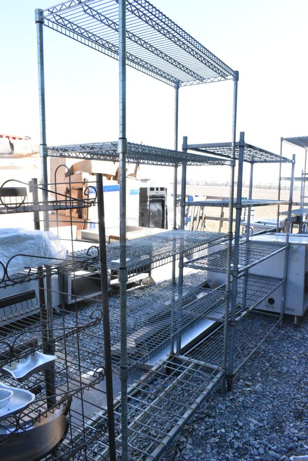 Chrome Finish Metal 5 Tier Shelving Unit. BUYER MUST DISMANTLE. PCI CANNOT DISMANTLE FOR SHIPPING. PLEASE CONSIDER FREIGHT CHARGES. - Image 1 of 5