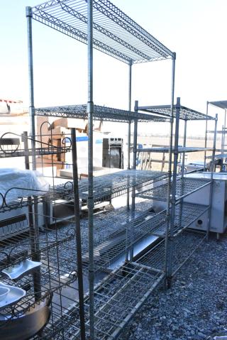 Chrome Finish Metal 5 Tier Shelving Unit. BUYER MUST DISMANTLE. PCI CANNOT DISMANTLE FOR SHIPPING. PLEASE CONSIDER FREIGHT CHARGES.