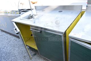 Duke Stainless Steel Counter w/ Sink Bay and 2 Green Wood Pattern Doors and Back Splash
