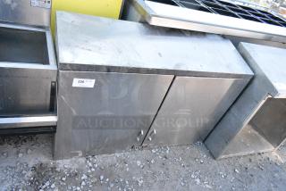Stainless Steel Cabinet w/ 2 Doors and Shelf.