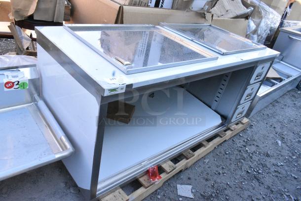 BRAND NEW SCRATCH AND DENT! Regency 600EBT3072R 30" x 72" 16 Gauge Type 304 Stainless Steel Enclosed Base Sliding Door Table with Drawers - Image 1 of 6