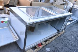 BRAND NEW SCRATCH AND DENT! Regency 600EBT3072R 30" x 72" 16 Gauge Type 304 Stainless Steel Enclosed Base Sliding Door Table with Drawers