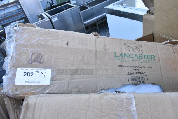 BRAND NEW SCRATCH AND DENT! Lancaster Table & Seating 427FCRVINWHT White Resin Folding Chair with Vinyl Seat.. May Be Missing Pieces. - Image 1 of 2
