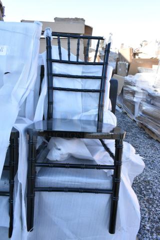 8 BRAND NEW SCRATCH AND DENT! Black Finish Chiavari Chairs. 8 Times Your Bid! May Be Missing Pieces.