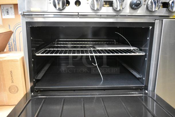 BRAND NEW! Cookrite ATO-12G4B Stainless Steel Commercial Propane Gas Powered 4 Burner Range w/ Left Side Flat Top Griddle, Oven and Salamander Cheese Melter on Commercial Casters. - Image 15 of 15