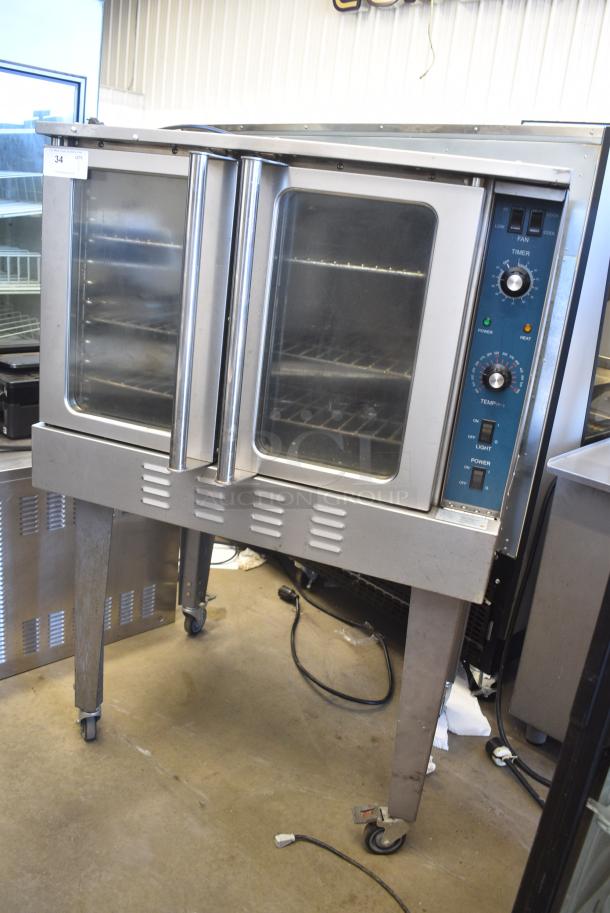 Duke Stainless Steel Commercial Full Size Convection Oven w/ View Through Doors, Metal Oven Racks, Thermostatic Controls and Metal Legs on Commercial Casters. - Image 1 of 11
