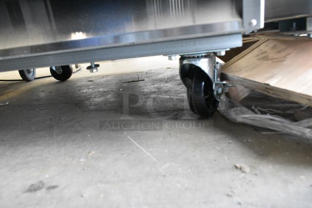 BRAND NEW SCRATCH AND DENT! 2024 Mainstreet 829BMR23R Stainless Steel Commercial Single Door Reach In Cooler w/ Poly Coated Racks on Commercial Casters. 115 Volts, 1 Phase. Tested and Working! - Image 4 of 7