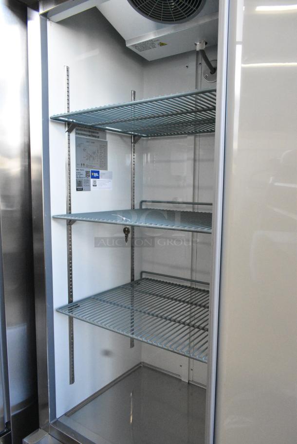 BRAND NEW SCRATCH AND DENT! 2024 Avantco 178A19FHC Stainless Steel Commercial Single Door Reach In Freezer w/ Poly Coated Racks on Commercial Casters. 115 Volts, 1 Phase. Tested and Powers On But Does Not Get Cold - Image 3 of 6