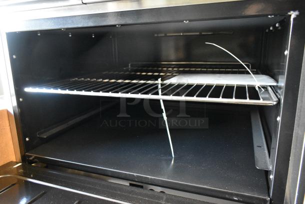 BRAND NEW! Cookrite ATO-12G4B Stainless Steel Commercial Propane Gas Powered 4 Burner Range w/ Left Side Flat Top Griddle, Oven and Salamander Cheese Melter on Commercial Casters. - Image 8 of 15