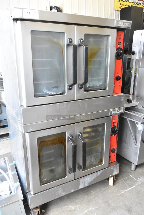 2 Vulcan VC4GD-11D150K Stainless Steel Commercial Natural Gas Powered Full Size Convection Oven w/ View Through Doors, Metal Oven Racks and Thermostatic Controls on Commercial Casters. 2 Times Your Bid! - Image 1 of 9