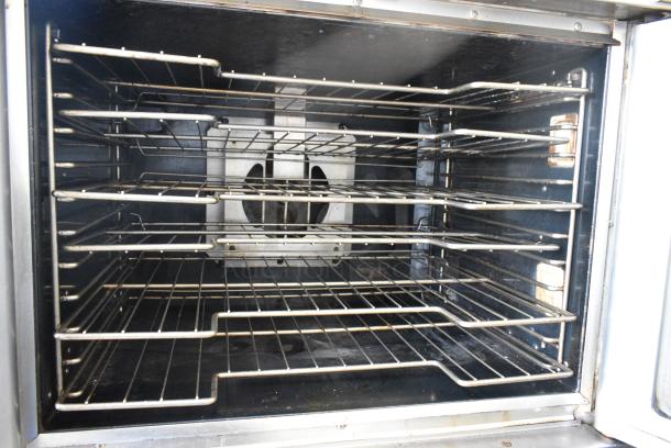 2 Vulcan VC4GD-11D150K Stainless Steel Commercial Natural Gas Powered Full Size Convection Oven w/ View Through Doors, Metal Oven Racks and Thermostatic Controls on Commercial Casters. 2 Times Your Bid! - Image 6 of 9