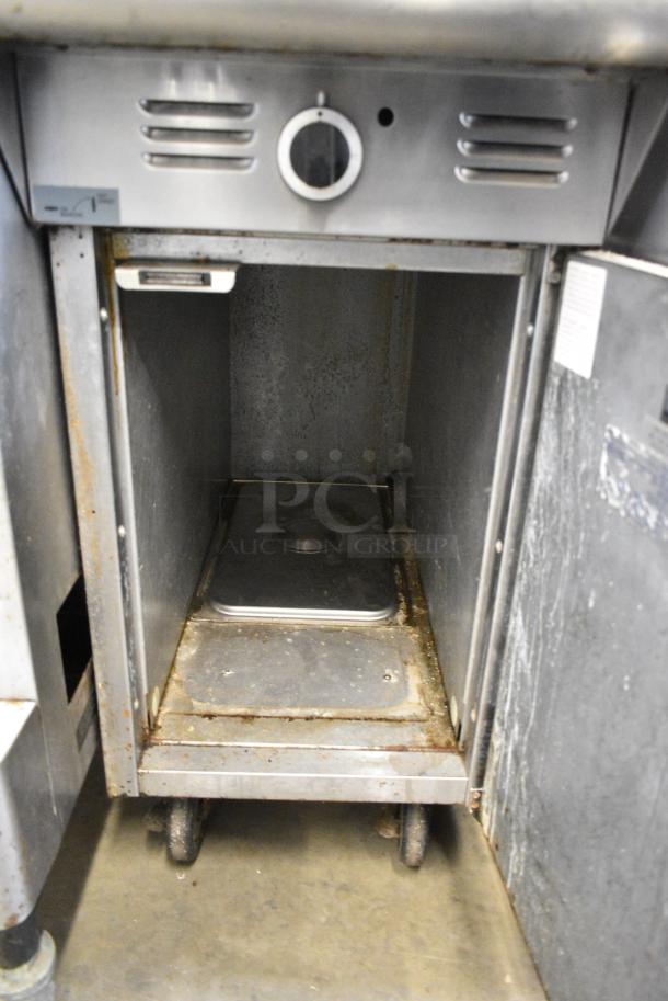 Garland M6S Stainless Steel Commercial Natural Gas Powered Flat Top Griddle w/ 2 Tier Over Shelf on Commercial Casters. - Image 6 of 7
