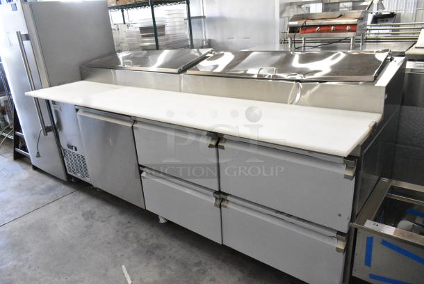 BRAND NEW SCRATCH AND DENT! 2024 Avantco 178SSPPT3 Stainless Steel Commercial 94" 3 Door Refrigerated Pizza Prep Table w/ 4 Drawers and 1 Door on Commercial Casters. 115 Volts, 1 Phase. Tested and Working! - Image 1 of 14