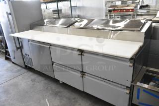 BRAND NEW SCRATCH AND DENT! 2024 Avantco 178SSPPT3 Stainless Steel Commercial 94" 3 Door Refrigerated Pizza Prep Table w/ 4 Drawers and 1 Door on Commercial Casters. 115 Volts, 1 Phase. Tested and Working!