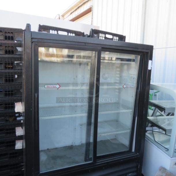 One WORKING True 2 Door Glass Display Cooler With 5 Racks On Casters. Model# GEM-41SL-60. 115 Volt. $5654.20. - Image 2 of 2