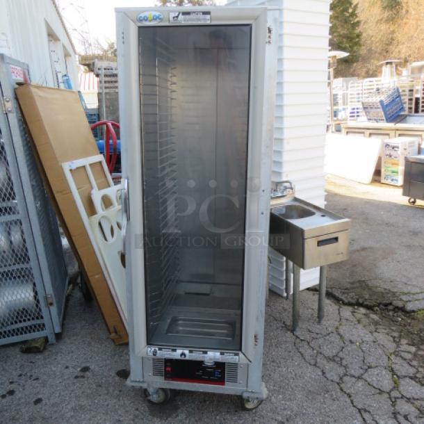 One WORKING Cozoc Heat And Hold On Casters. Model# HPC7101. 120 Volt. 1500 Watt.  24.5X31.5X67. $2880.00. - Image 1 of 3