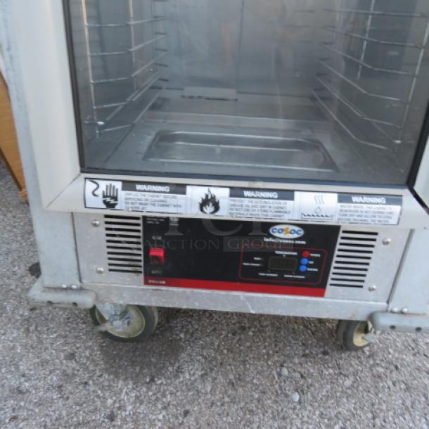 One WORKING Cozoc Heat And Hold On Casters. Model# HPC7101. 120 Volt. 1500 Watt.  24.5X31.5X67. $2880.00. - Image 2 of 3