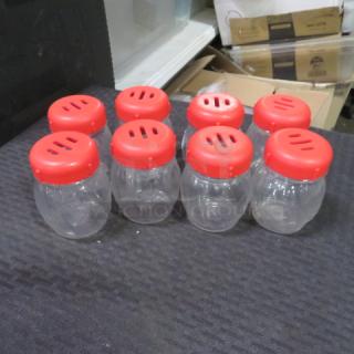 One Lot Of 8 Pepper/Cheese Shakers.