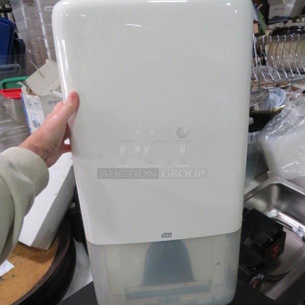 One NEW Tork Wall Mount Napkin Dispenser. - Image 1 of 2