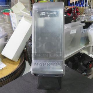 One Tork Xpress Table Top Napkin Dispenser.