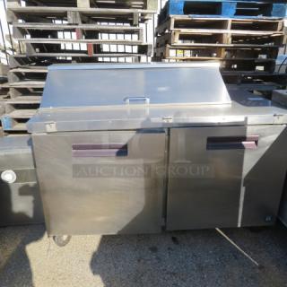 One WORKING Hoshizaki 2 Door Refrigerated Prep Table On Casters. Model# CRMR60-12. 115 Volt. 60X30X45. $7155.00